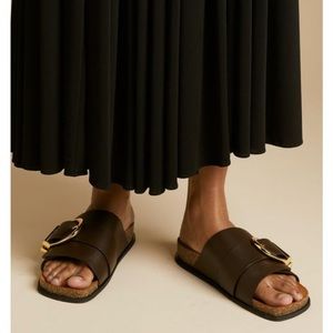 KHAITE Brown Leather Slide Sandals with Gold Buckle